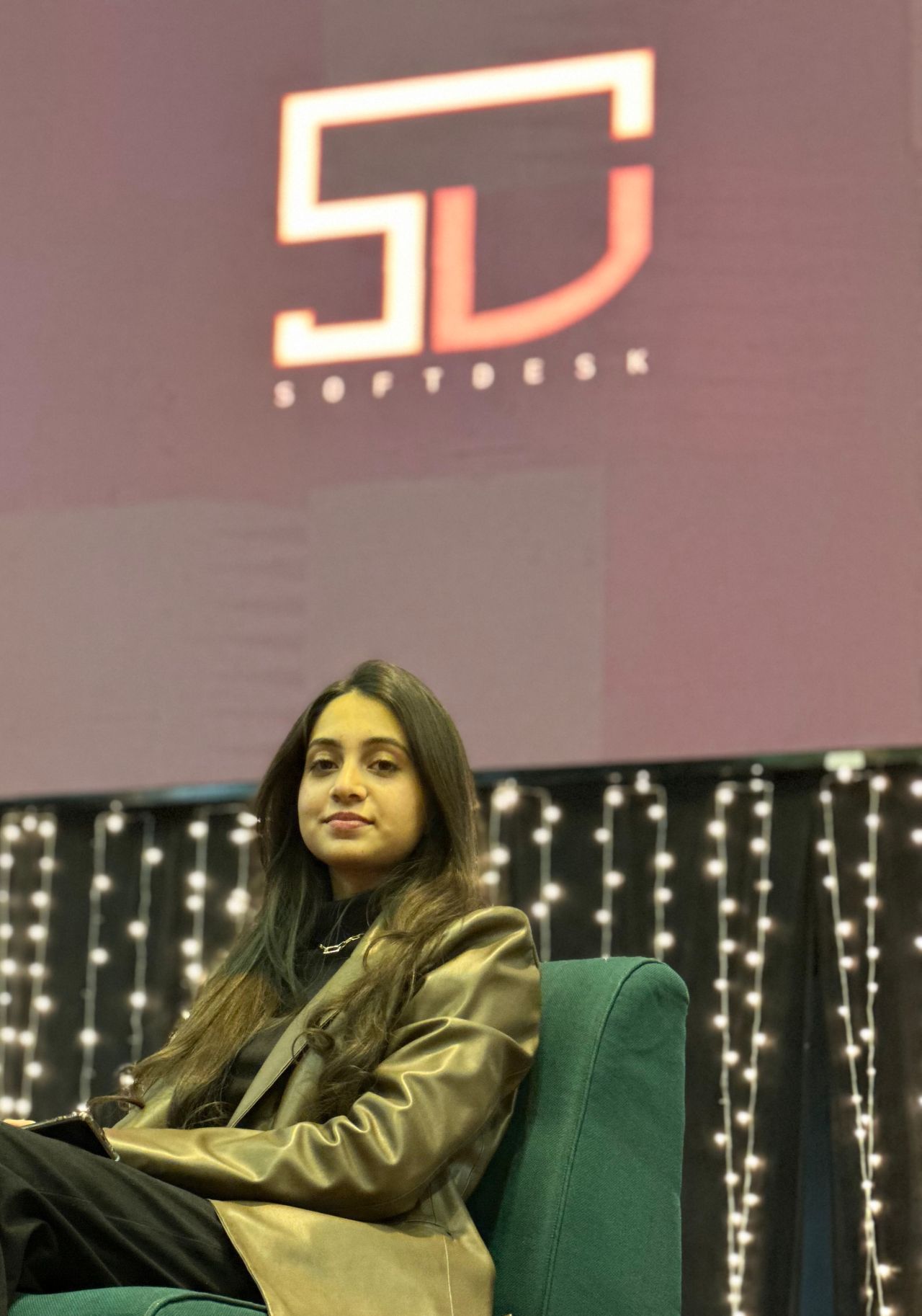 On stage at a panel discussion